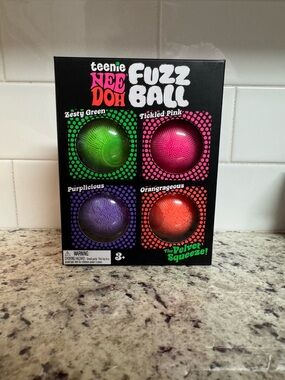teenie NEE DOH Fuzz Ball 4-Pack Kids Toy - Green, Pink, Purple, Orange